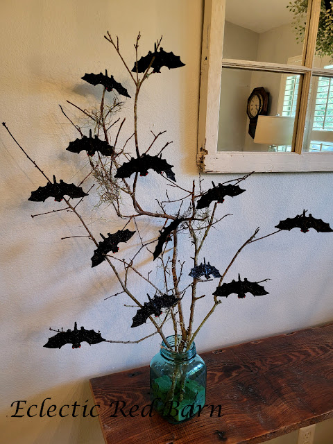 Bat, Branches, and Bows. Share NOW.#Halloween, #halloweendecor, #halloweendecorations, #DollarTreeCraft, #eclecticredbarn